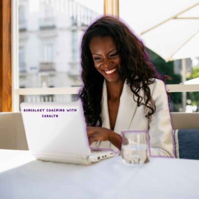 Image of black lady at computer representing Genealogy Coaching with Carolyn.